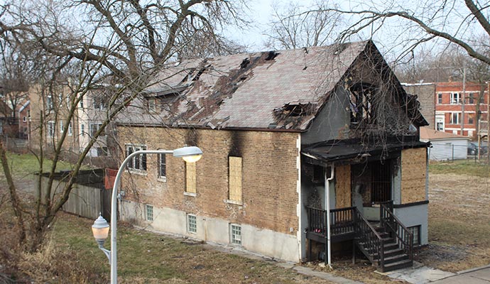 Abandoned fire damaged residential home