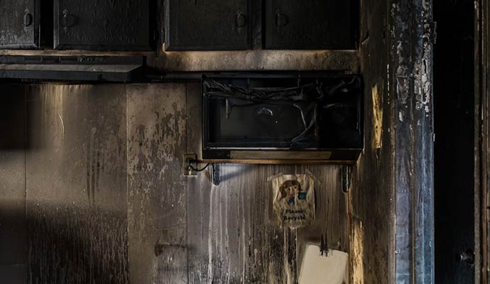 Electrical fire damage in a kitchen