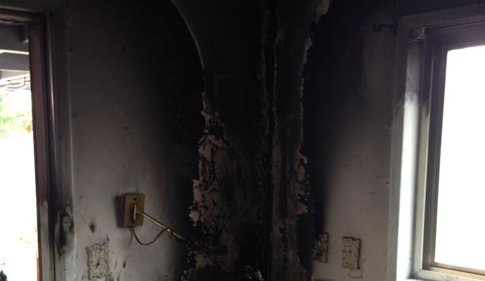 Fire damage wall electrical outlet