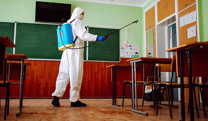 Professional disinfecting service in a classroom