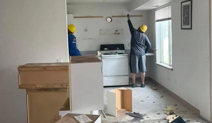 Professioanl team remodeling a residential kitchen