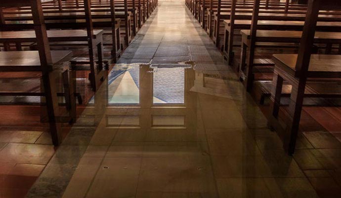 Standing water on the floor inside of a church