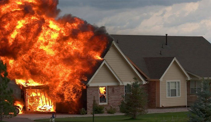 Fire burning a residential house