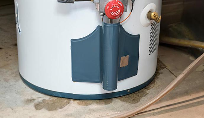 A gas water heater tank leaking water